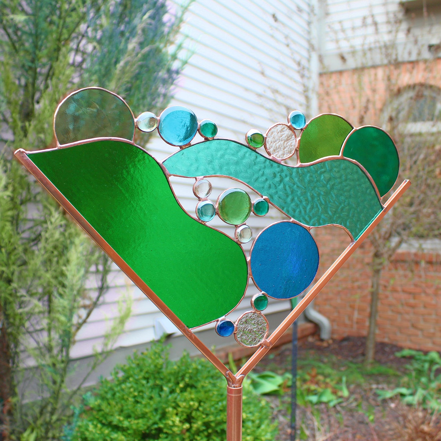 Stained Glass Martini Garden Art Stake. Greens & Blue. Colorful and unique yard decor that enhances your garden.