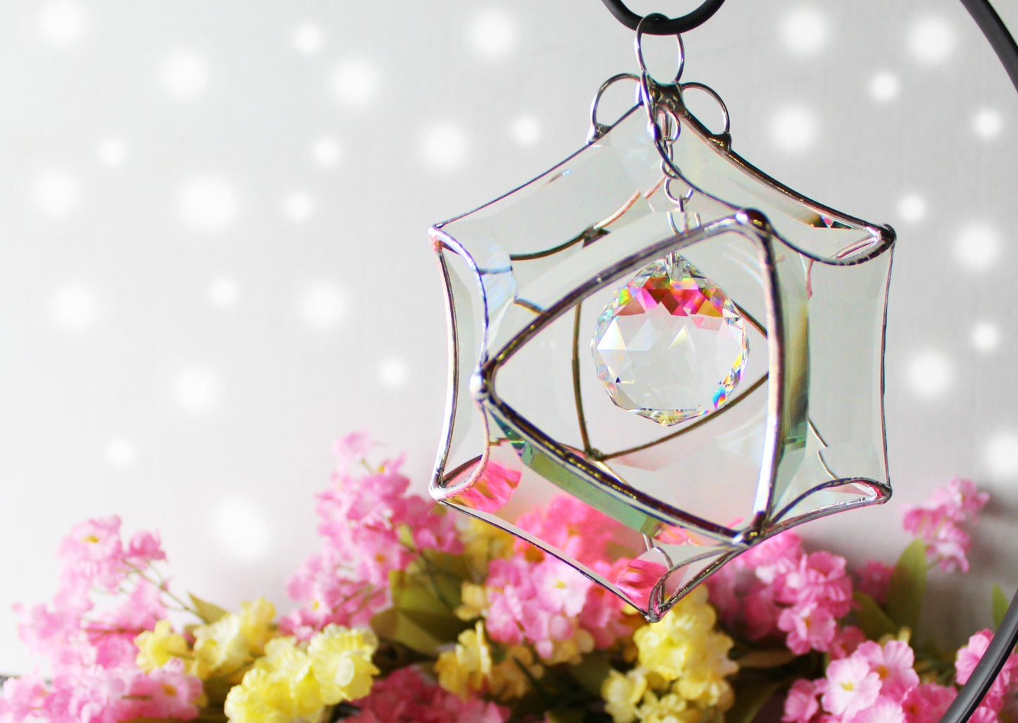 Stained glass star suncatcher. Silver finished faceted glass. Sunny window prism maker.