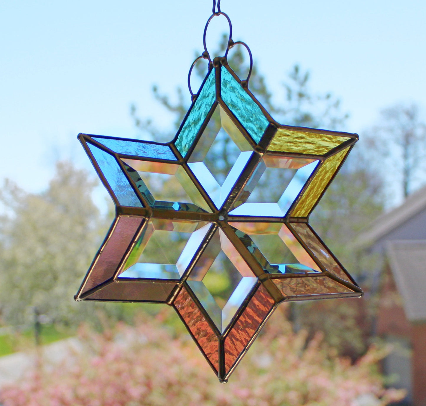 Stained Glass Spinner. Hanging beveled glass creates prisms with sunshine. Pastels.
