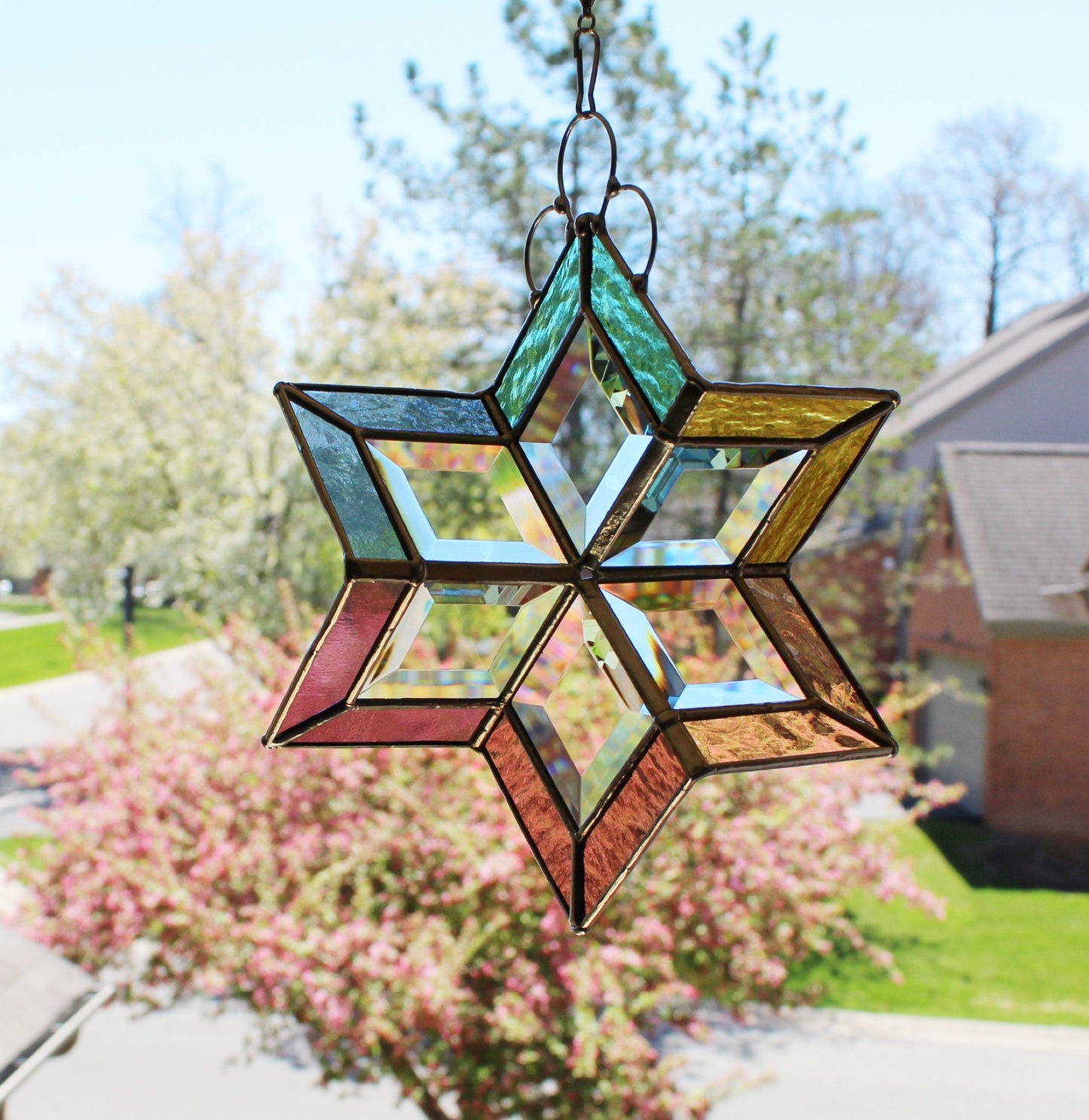 Stained Glass Spinner. Hanging beveled glass creates prisms with sunshine. Pastels.