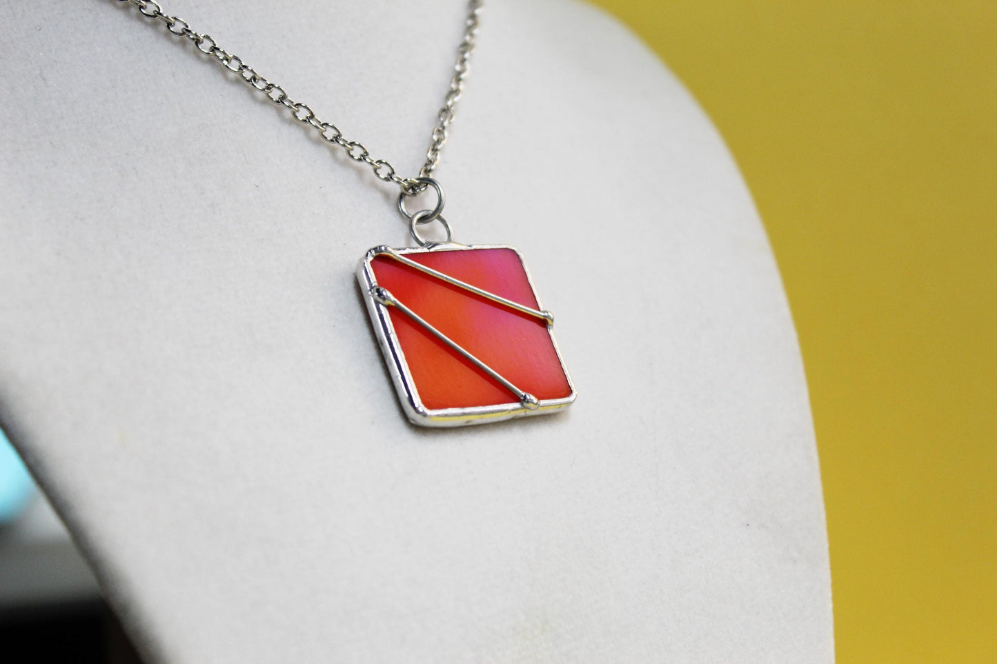 Deep orange glass pendant necklace with chain. Small jewelry. Wearable art.