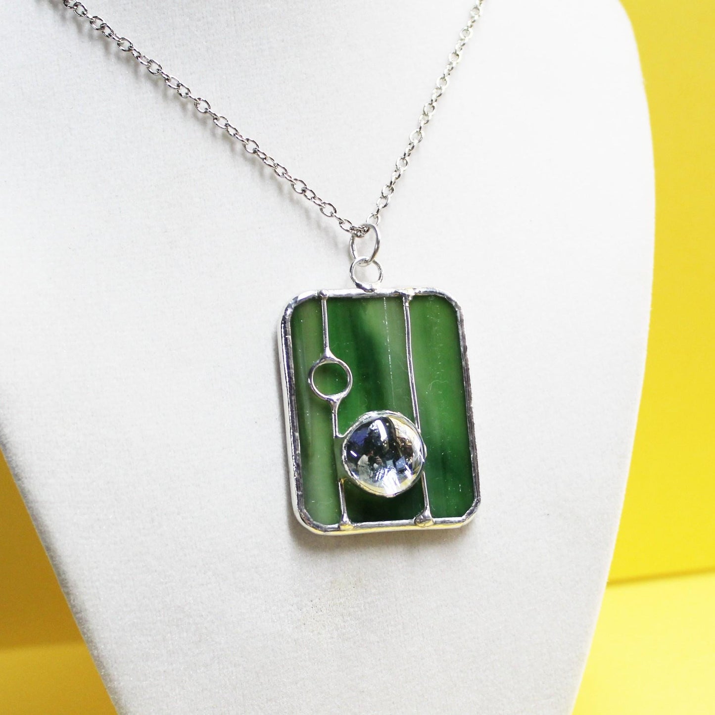 Dark green wispy glass pendant necklace with chain. Stained glass jewelry. Wearable art.