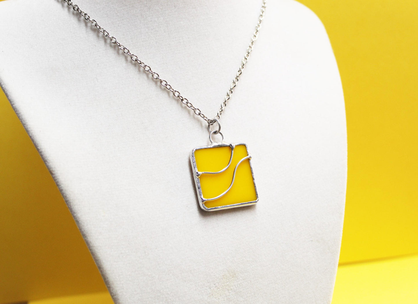 Yellow marigold glass pendant necklace with chain. Small jewelry. Wearable art.