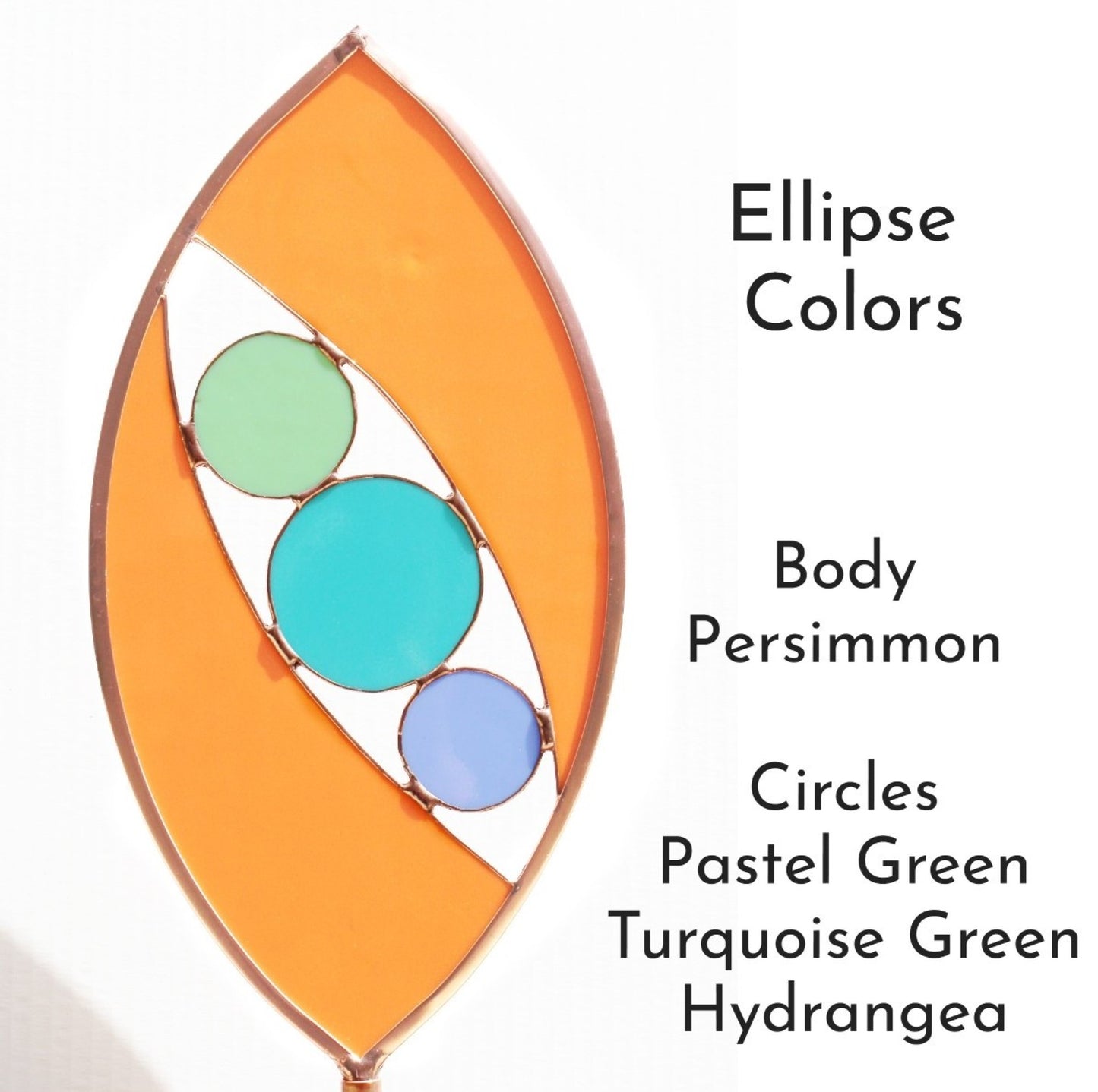 Ellipse shaped glass garden art stake. Persimmon. Copper framed. Opaque glass.