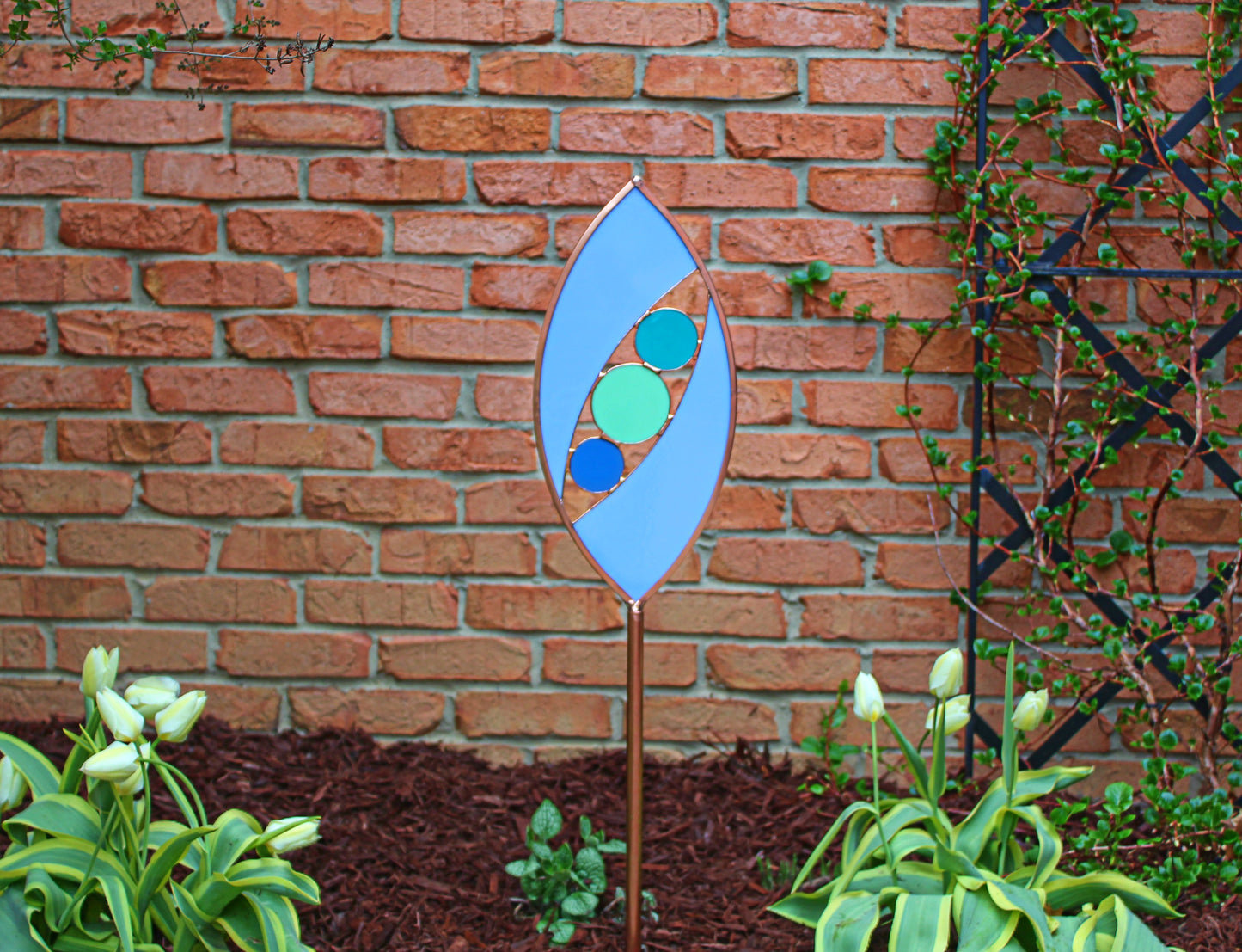 Ellipse shaped glass garden art stake. Hydrangea Blue. Copper framed. Opaque glass.