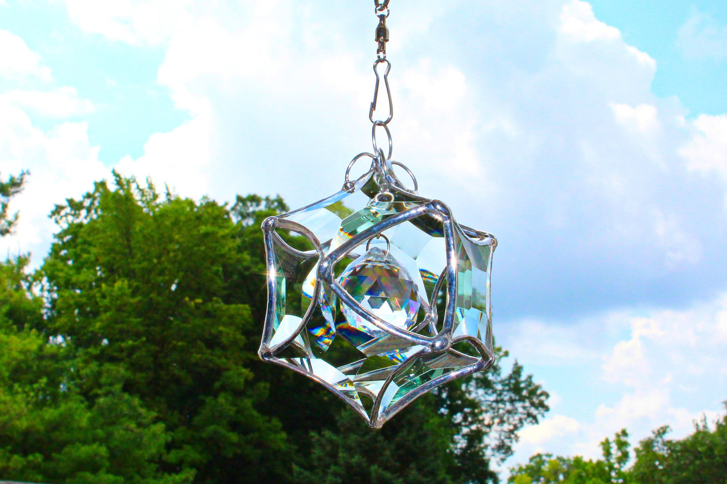 Stained glass star suncatcher. Silver finished faceted glass. Sunny window prism maker.