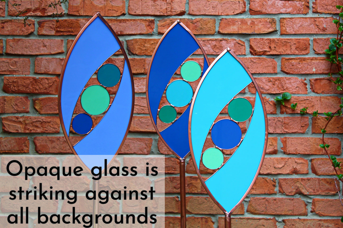 Ellipse shaped glass garden art stake. Hydrangea Blue. Copper framed. Opaque glass.