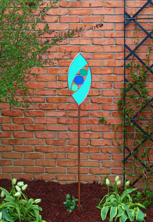 Ellipse shaped glass garden art stake. Turquoise Green. Copper framed. Opaque glass.