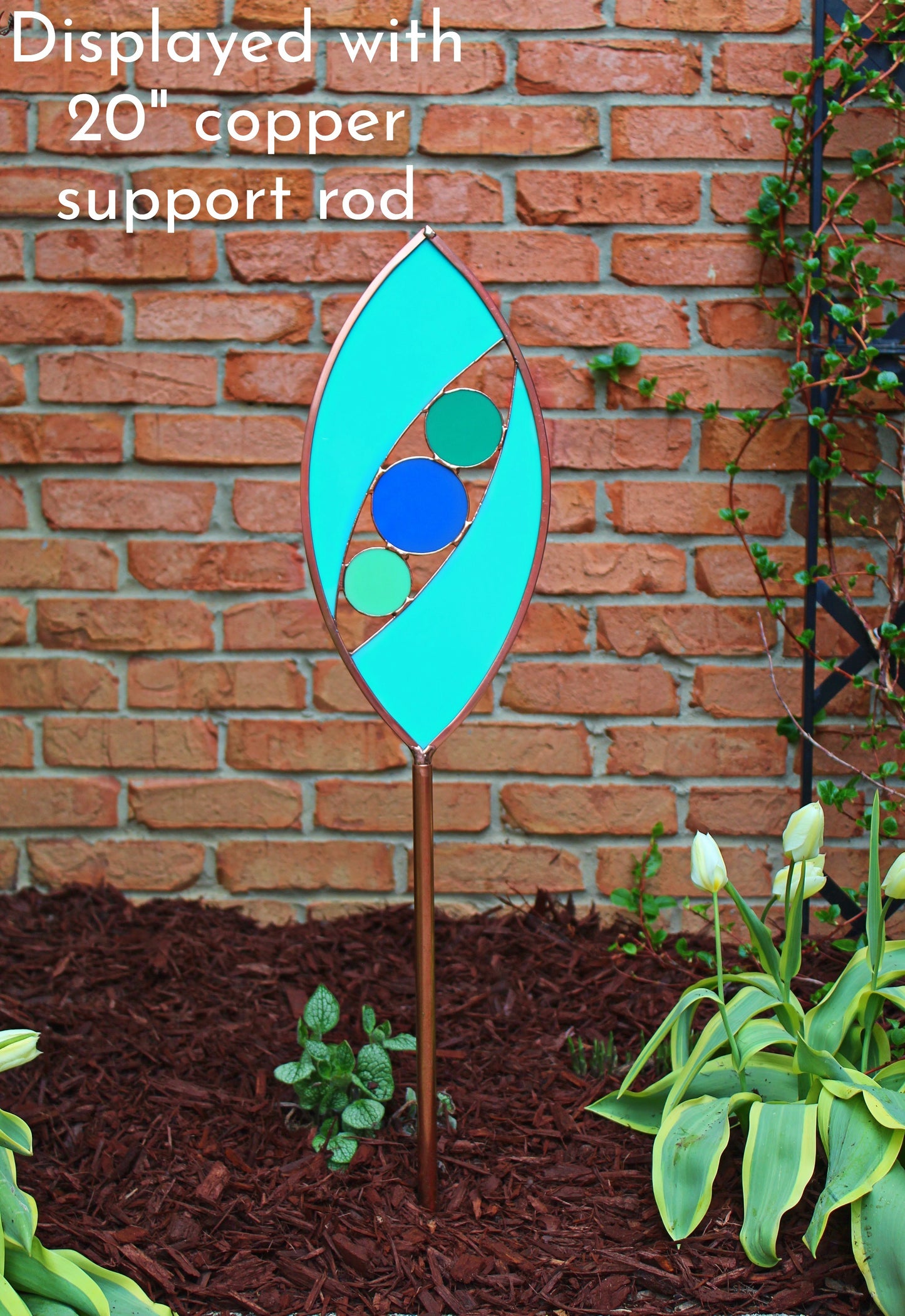 Ellipse shaped glass garden art stake. Turquoise Green. Copper framed. Opaque glass.